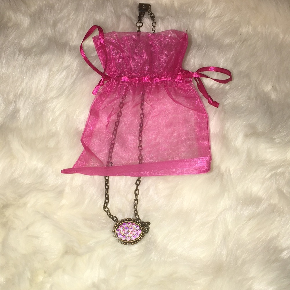 pink panache necklace worn twice